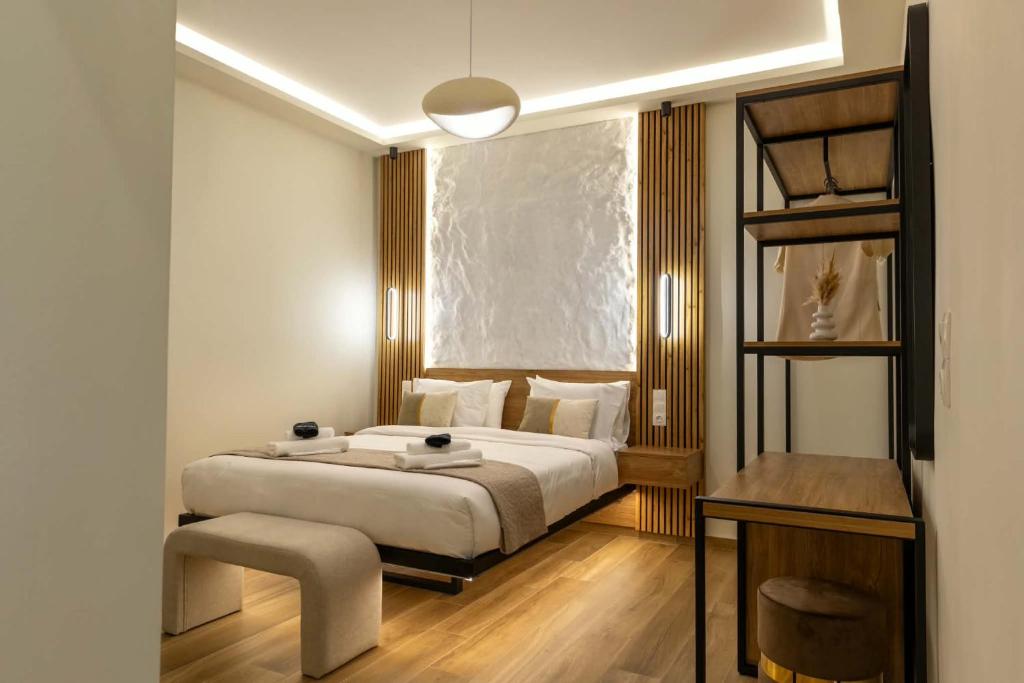 a bedroom with a large bed and a window at Charma Urban Living in Bendevís