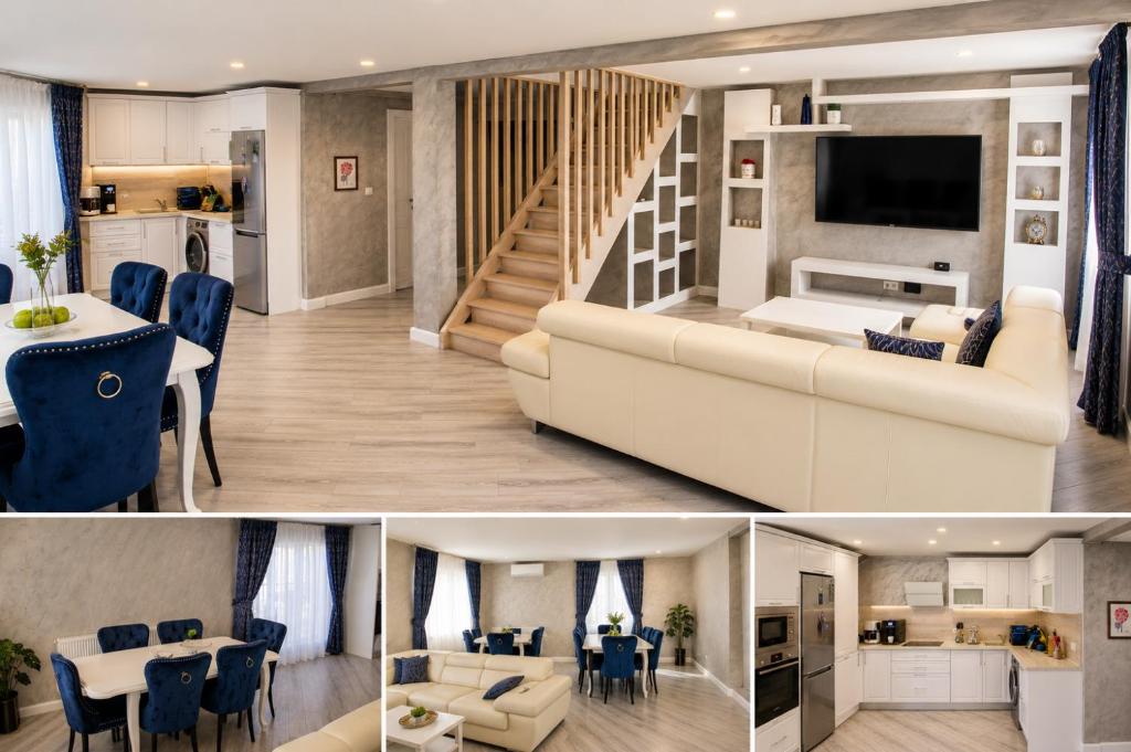 a living room and a dining room with a couch and a table at Apartament Deluxe Bistrita in Bistriţa