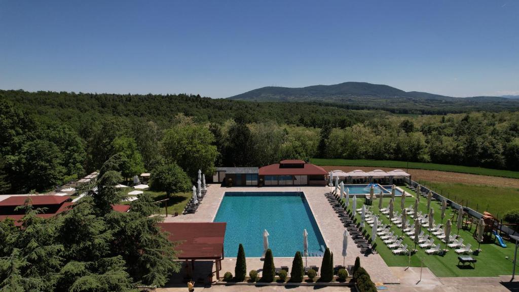 an aerial view of a resort with a swimming pool at Kosmajski Izvor in Sopot