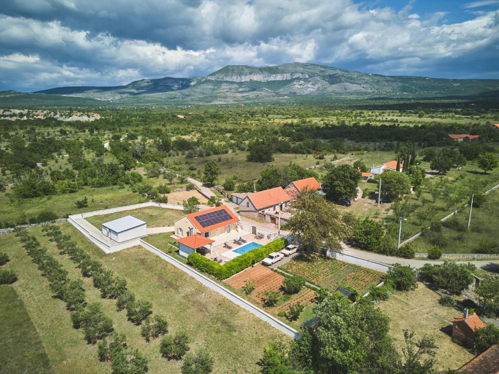 an aerial view of a estate with a house at House Mellifera in Razvođe
