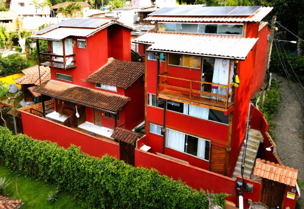 an aerial view of a red building at Mi Casa Su Casa Lofts in Abraão