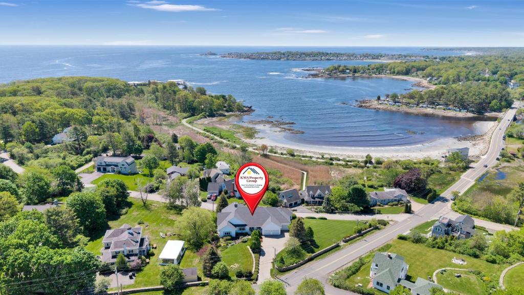 an aerial view of a house with a for sale sign at The Hill Dog Friendly Panoramic Ocean Views in York