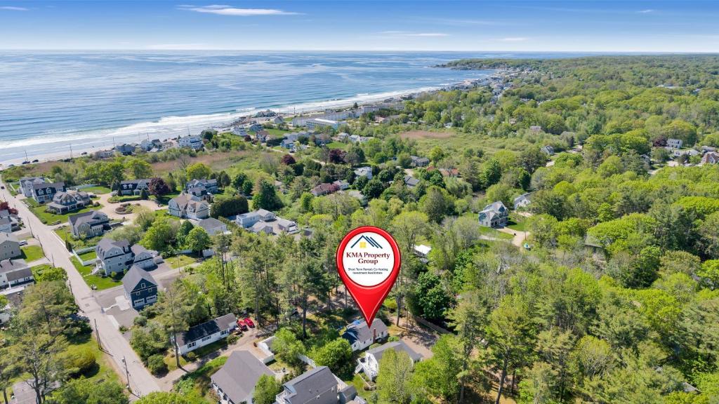 an aerial view of a home with a road sign at Cornish Cottage Walk to Long Sands Beach in York