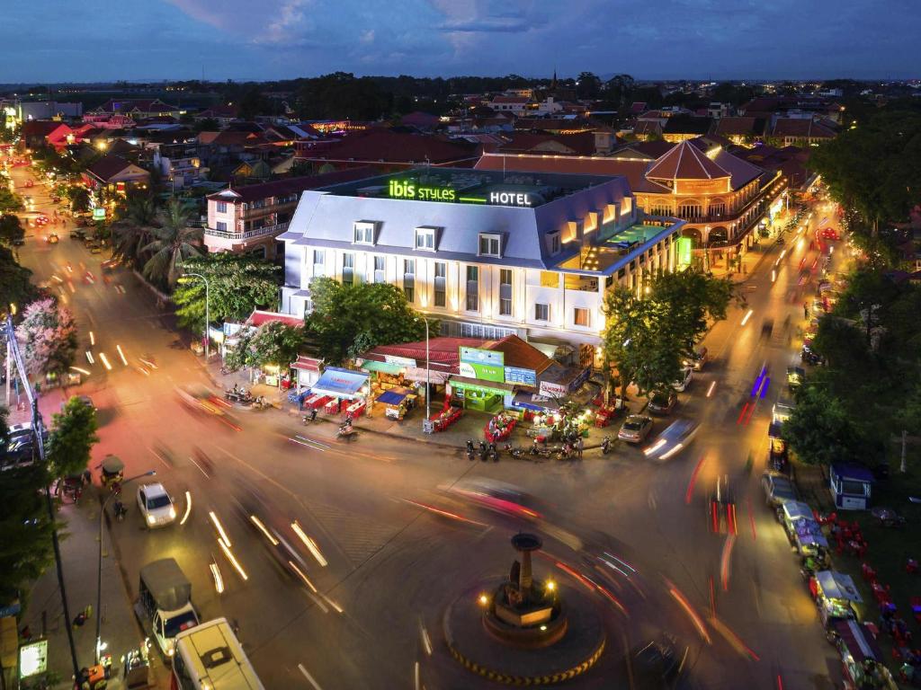 an overhead view of a city street at night at ibis Styles Siem Reap in Siem Reap