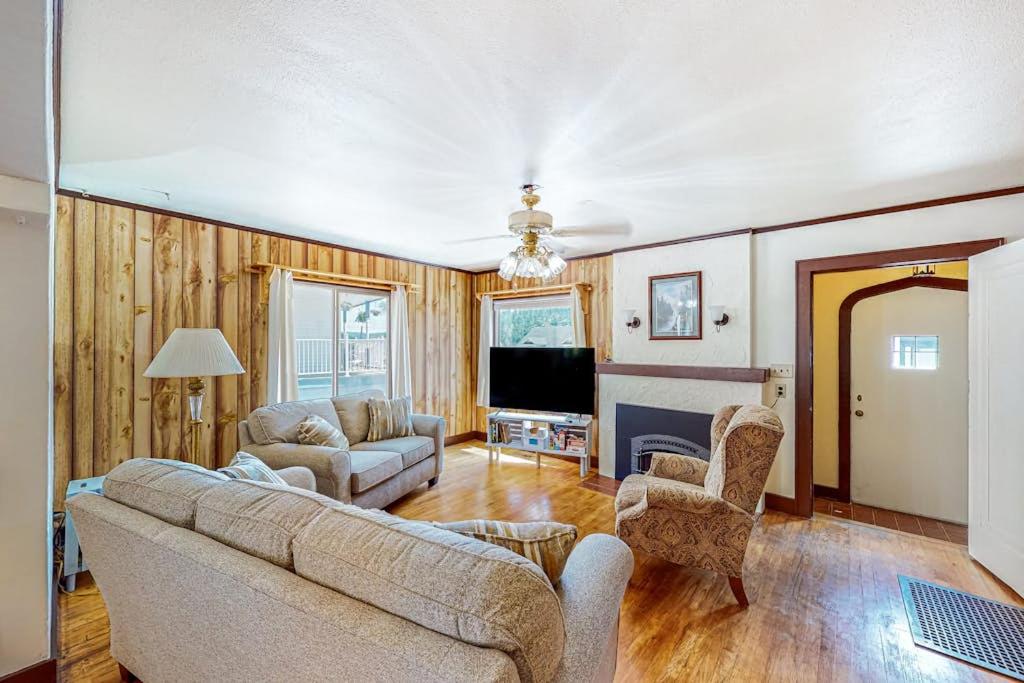 a living room with a couch and a television at Enchanting Adobe in Lead