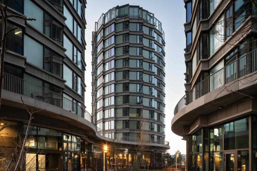 two tall buildings next to each other at Locke Copenhagen in Copenhagen
