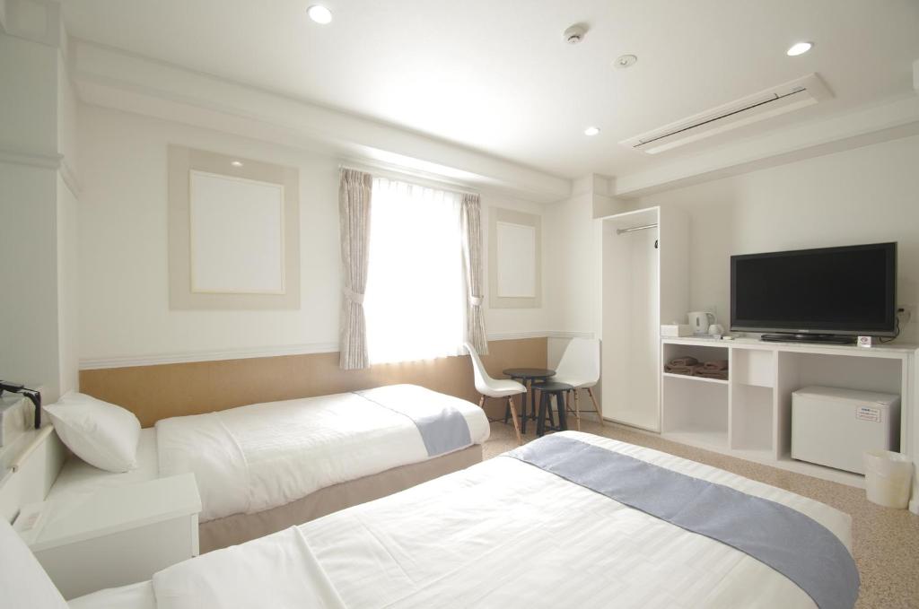 Televiisor ja/või meelelahutuskeskus majutusasutuses Hotel Imalle Yokohama Isezakicho