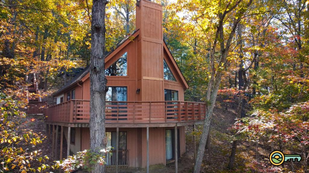a tree house in the middle of the forest at Villa #102 in Basye