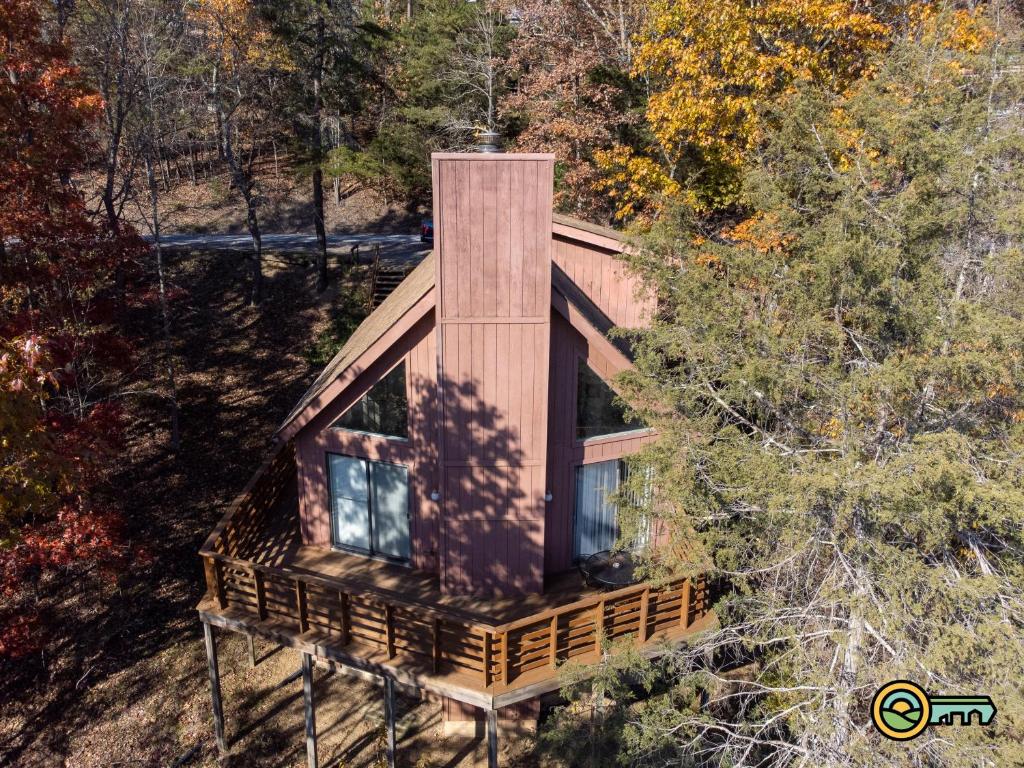 an aerial view of a cabin in the woods at Villa #364 in Basye