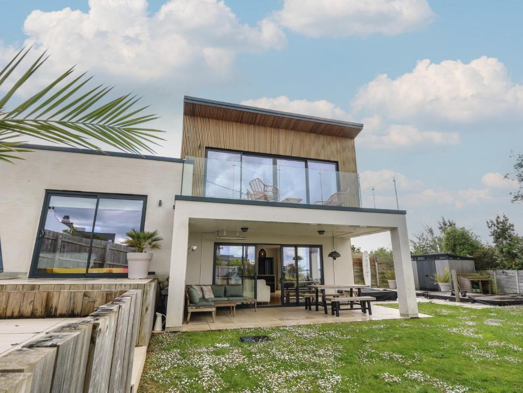a house with a view of the backyard at Aquanaut in Cowes