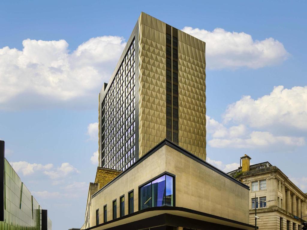 a tall building with windows on the side of it at Mercure Newport in Newport