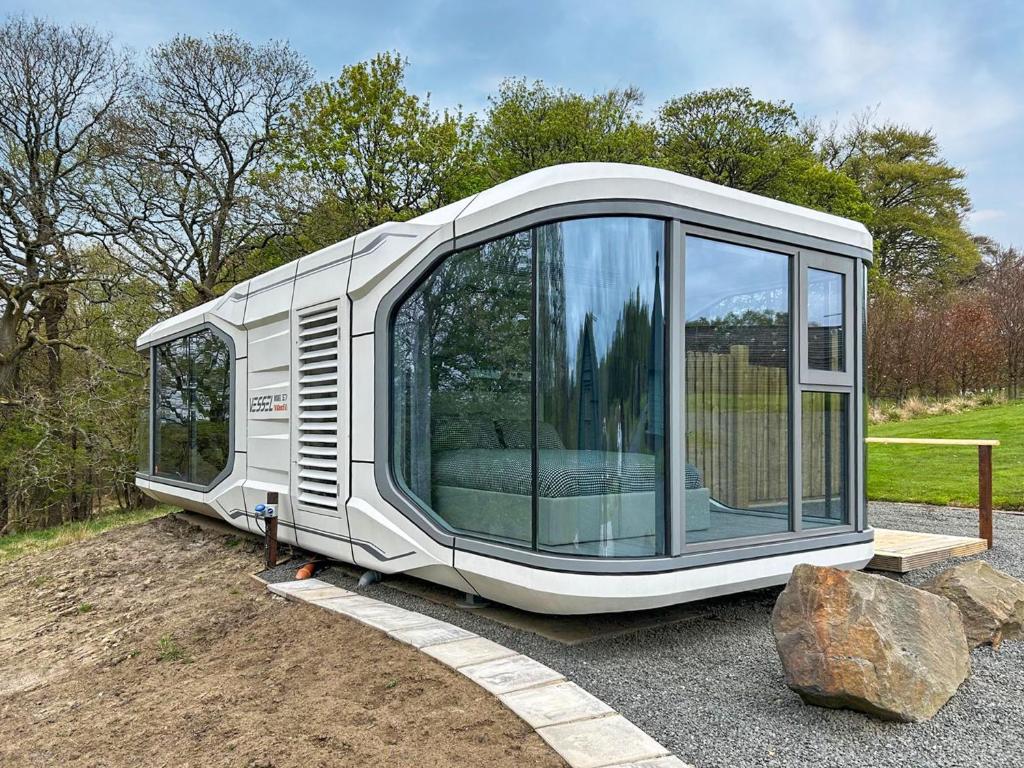 an exterior view of a large glass house on the ground at Vessel 2 - Ukc9442 in Glasgow