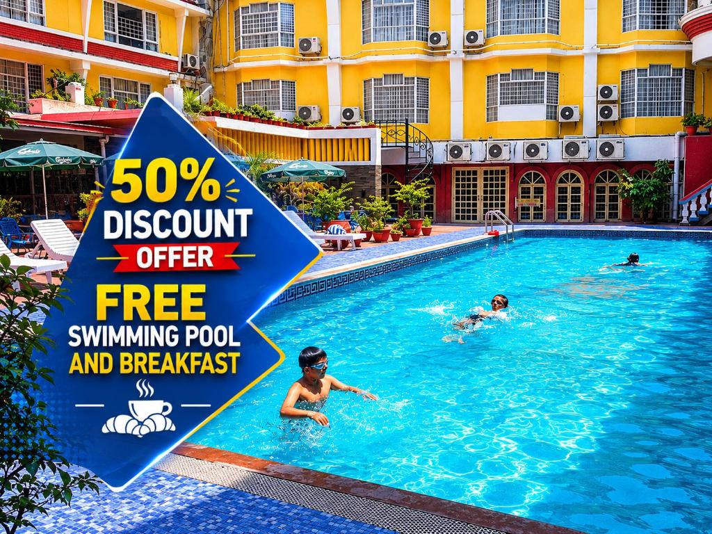 a sign in a swimming pool at a hotel at Hotel Woodland Kathmandu in Kathmandu