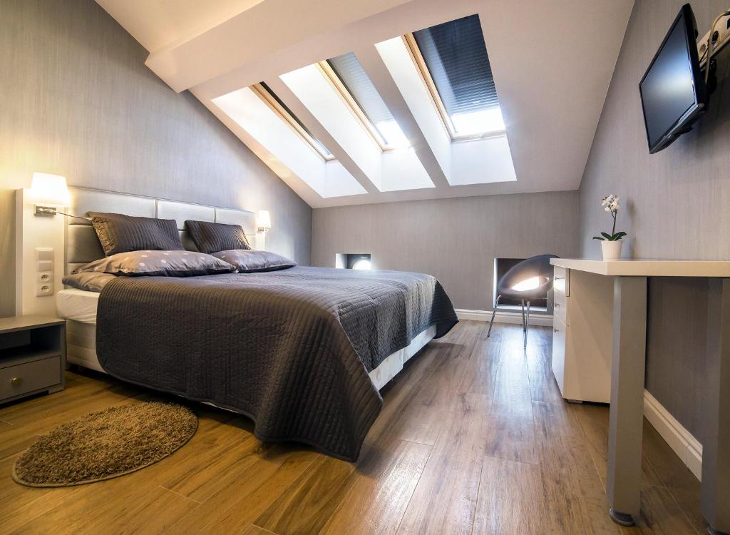 Posteľ alebo postele v izbe v ubytovaní Softly Residence
