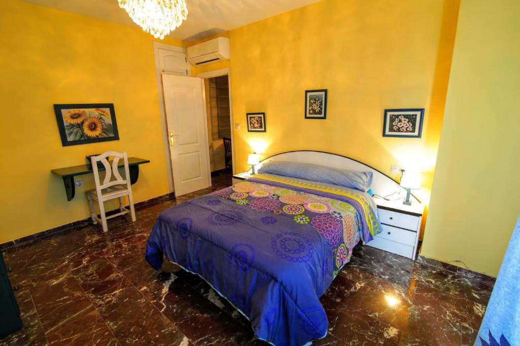 Posteľ alebo postele v izbe v ubytovaní Apartamentos Turísticos La Fonda