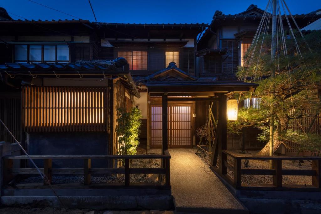 an entrance to a house at night at Hikoso-machi Gin no Ma in Kanazawa