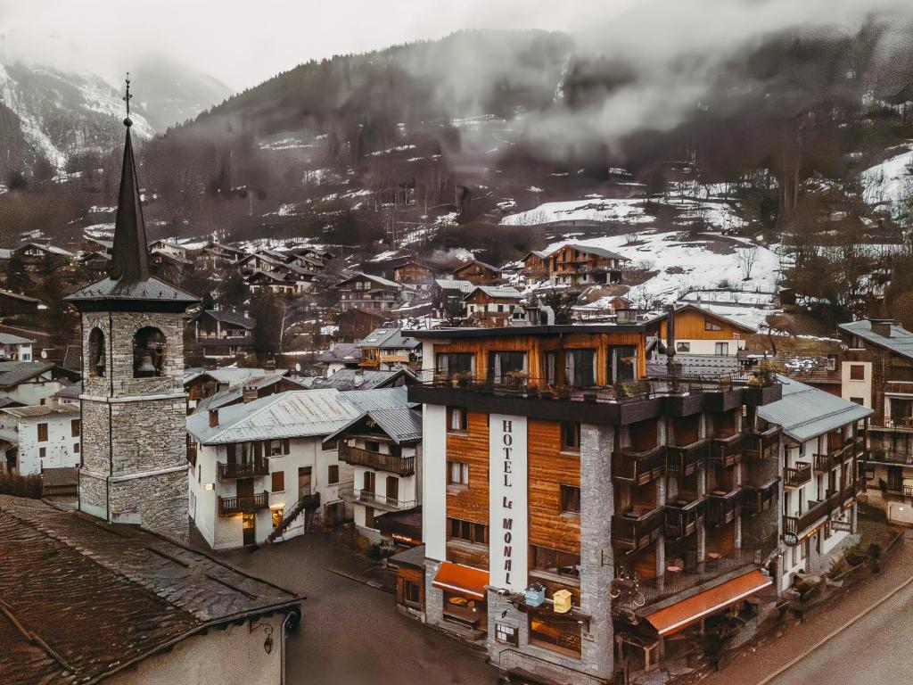 an aerial view of a town with a church at Hôtel Le Monal in Sainte-Foy-Tarentaise