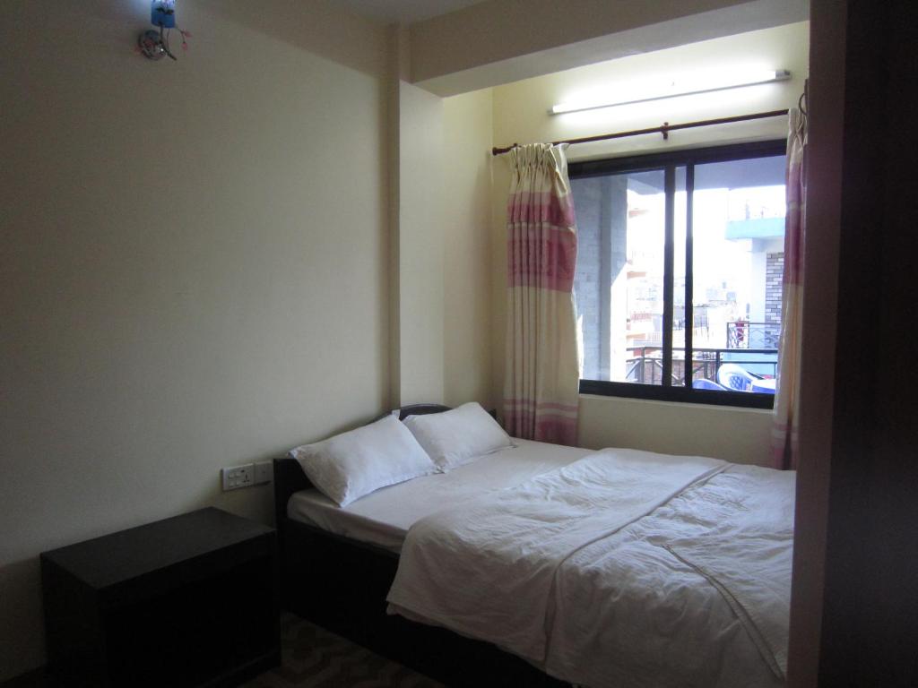 Letto o letti in una camera di Hotel Sunflower