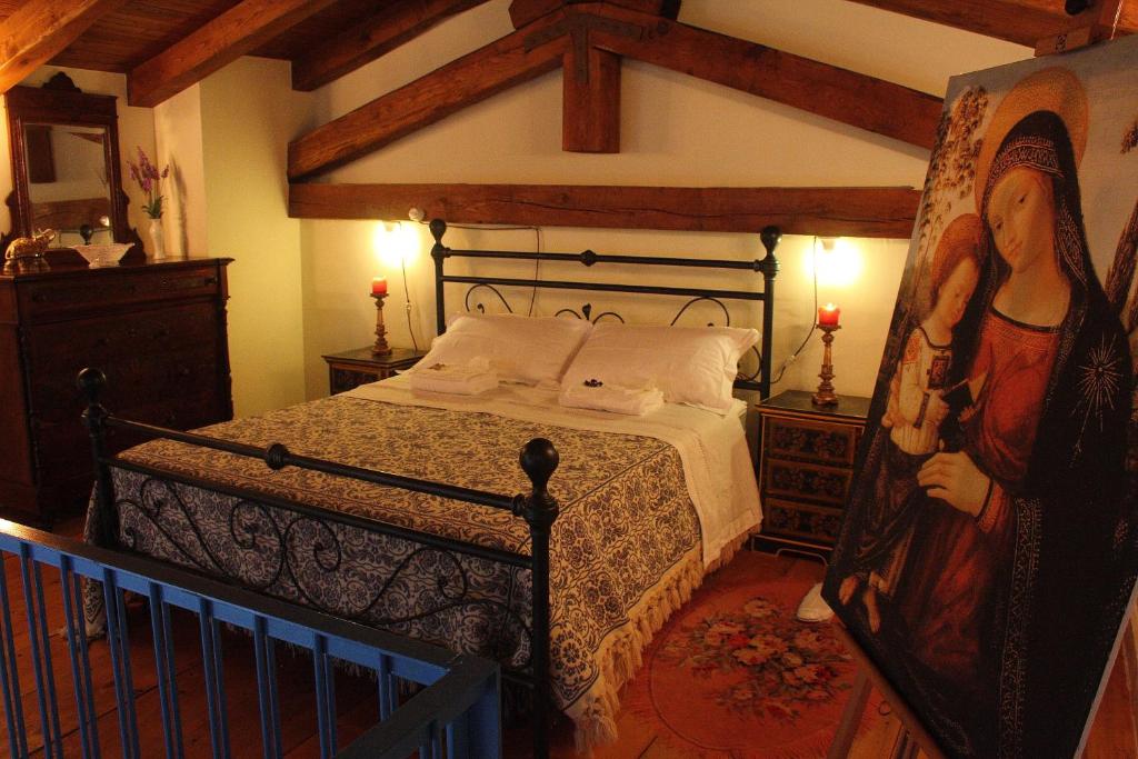 Postel nebo postele na pokoji v ubytování B&B Palazzo La Loggia