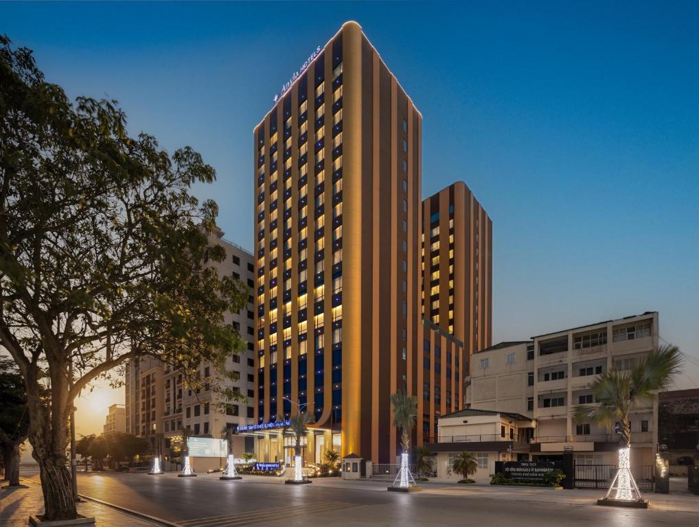 a rendering of a tall building in a city at Anyla Sầm Sơn Hotels in Sầm Sơn