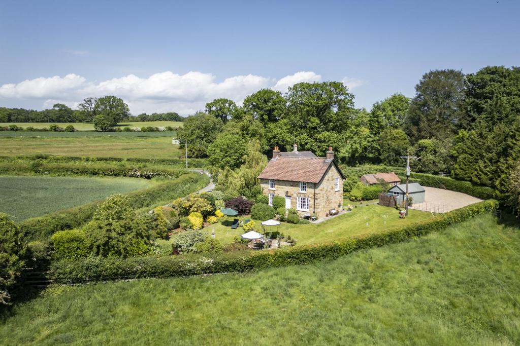an aerial view of a house with a garden at Virginia Cottage 4 in York