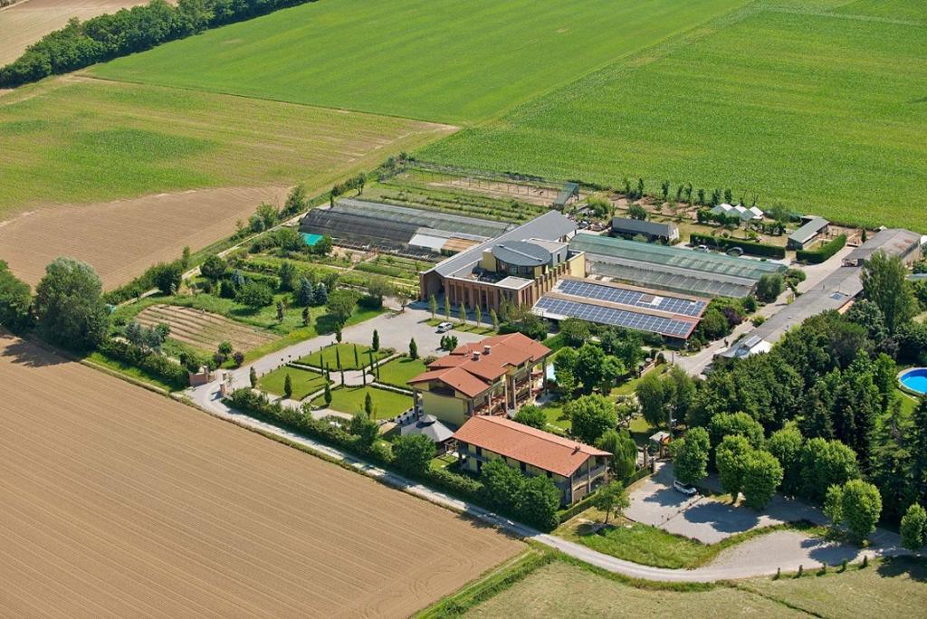 an aerial view of a building in a field at Fondo Brugarolo in Busnago