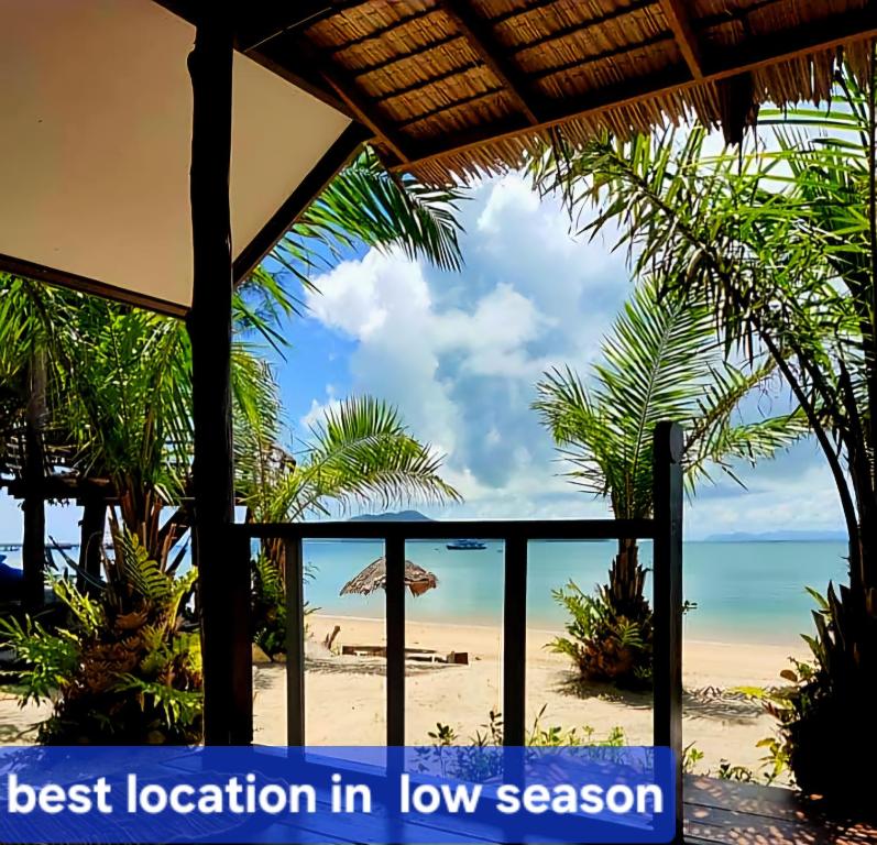 a view of the beach from a resort balcony at Sabai Sabai Beach Bungalows in Ko Phayam