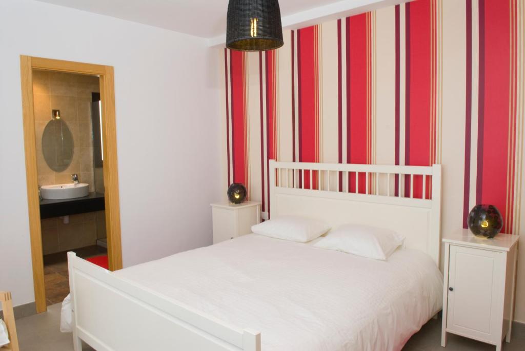 Posteľ alebo postele v izbe v ubytovaní Villas Las Maretas