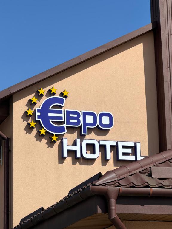 a sign for a europe hotel on the side of a building at Euro Hotel Hostel in Kovel