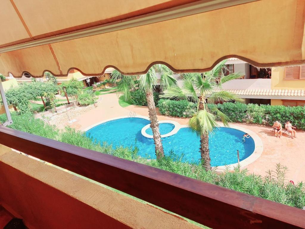 Apartment En Punta Prima con 3 Piscinas, 2 dormitorios,2 baños ,parking y seguridad 24 horas