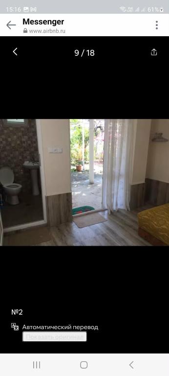 a picture of a room with a door and a window at mianino in Itʼkhvisi