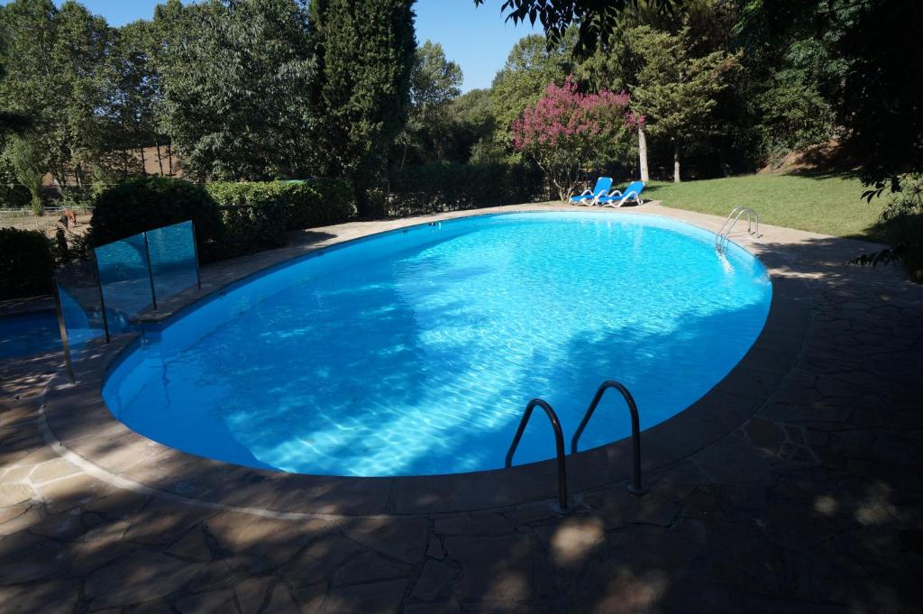 The swimming pool at or close to Hotel Can Ribalta