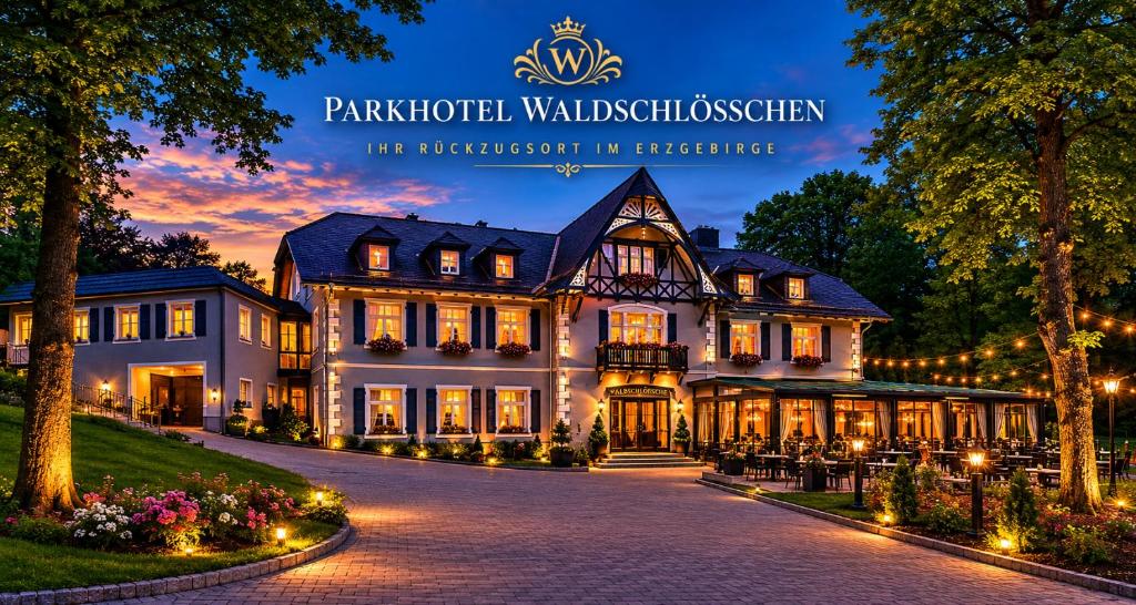 a rendering of a mansion at night with lights at Parkhotel Waldschlösschen in Annaberg-Buchholz