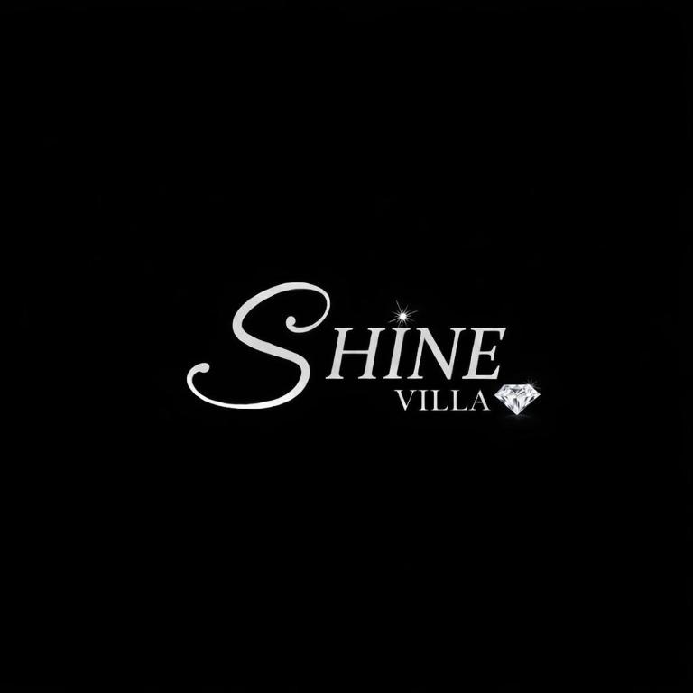a logo for shine villa on a black background at Shine villa in Krstac