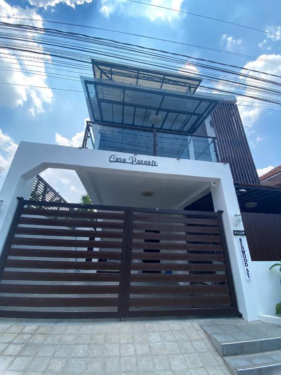 a front door of a building with a staircase at Casa Buenafe in Antipolo