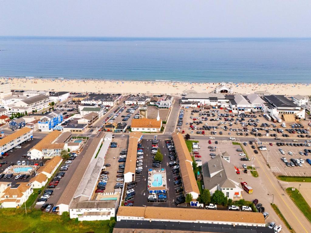 an aerial view of a parking lot next to the beach at The Janmere Motel in Hampton
