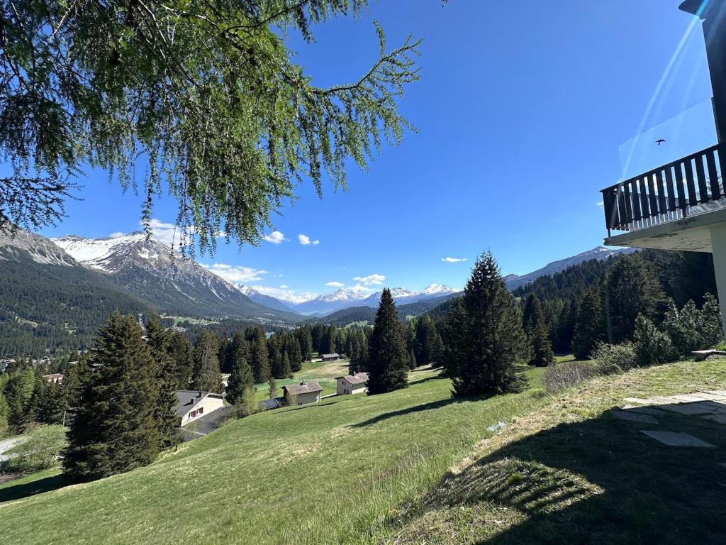 a view of the mountains from a house at Chalet Vallese Valbella Lenzerheide, great view in Valbella