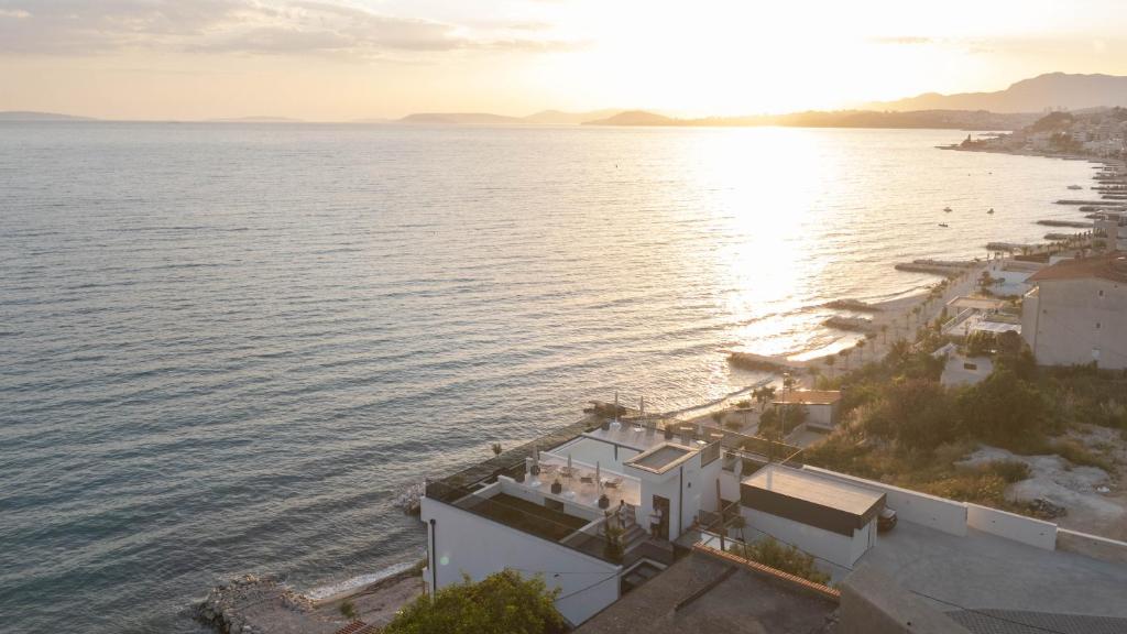 an aerial view of a beach next to the water at Stella Maris Beach in Podstrana