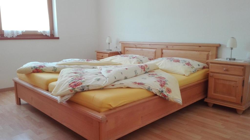 Postel nebo postele na pokoji v ubytování Arche Hof Bichler