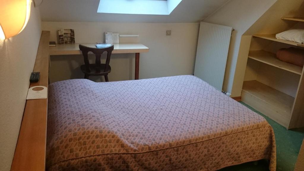 Postel nebo postele na pokoji v ubytování Sud Hotel