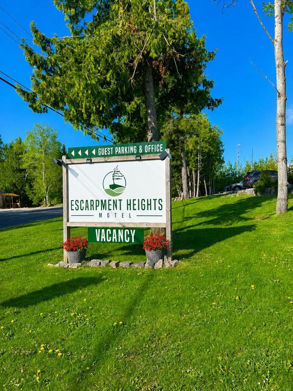 a sign for the easthament heights waterway at Escarpment Heights Motel in Tobermory
