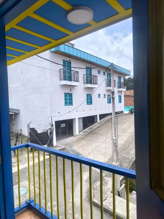 a view of a building from a balcony at apartamento vacacional in Salento