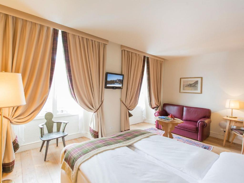 Postel nebo postele na pokoji v ubytování Hotel Bernina 1865 by Kleos Group Collection