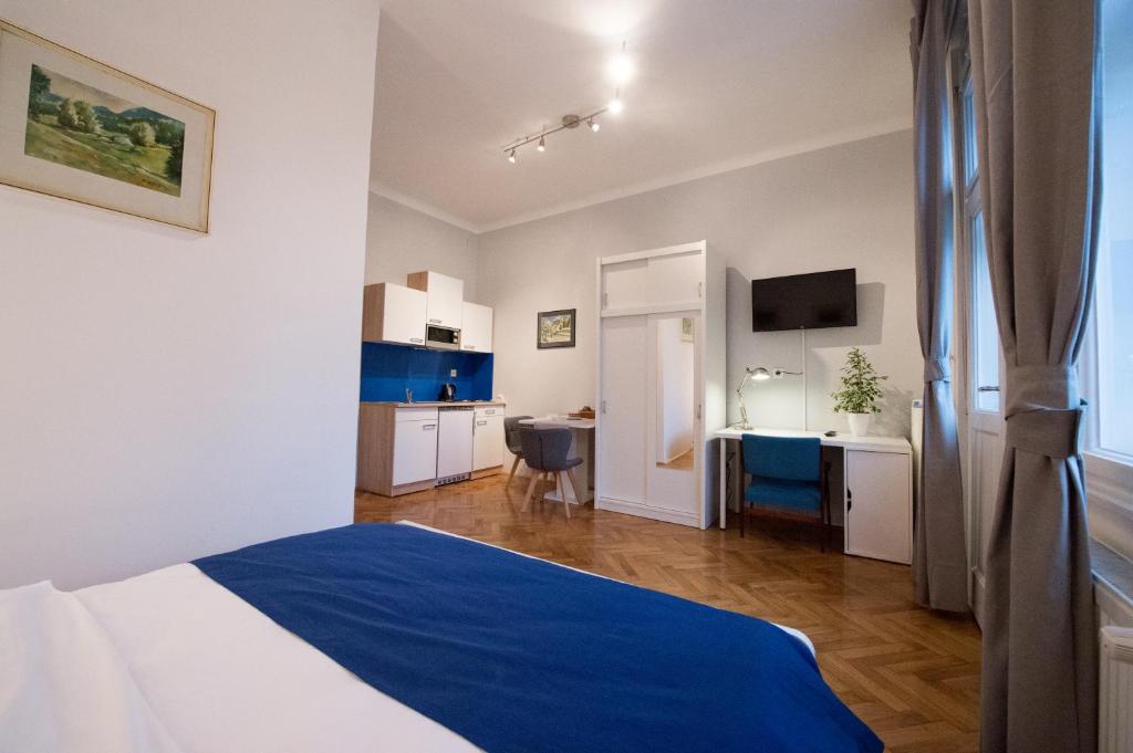 Postel nebo postele na pokoji v ubytování B&B Vila Teslova