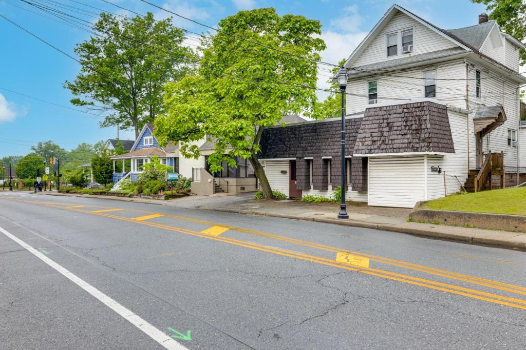 a white house on the side of a street at Train to Philly! Pet-Friendly Unit in Barrington in Barrington