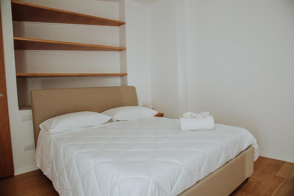 Postel nebo postele na pokoji v ubytování New Suite Lecce