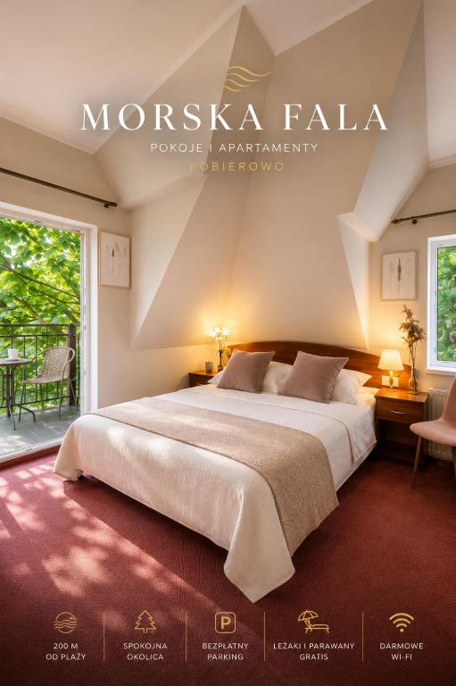 a bedroom with a large bed and a balcony at Morska Fala in Pobierowo