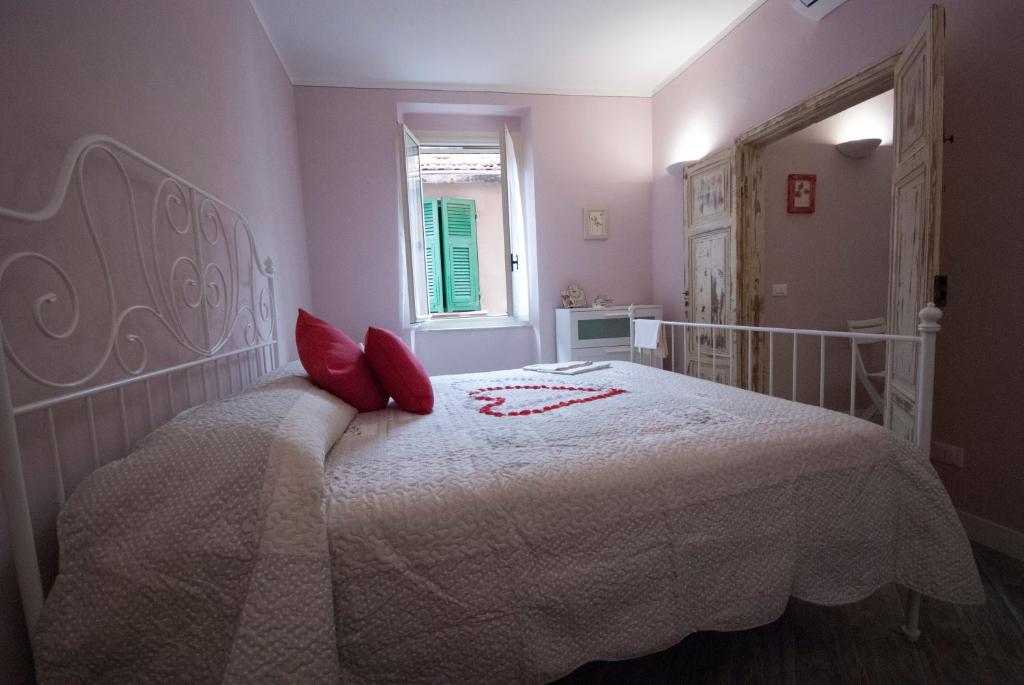 Postel nebo postele na pokoji v ubytování Cà de Lelio