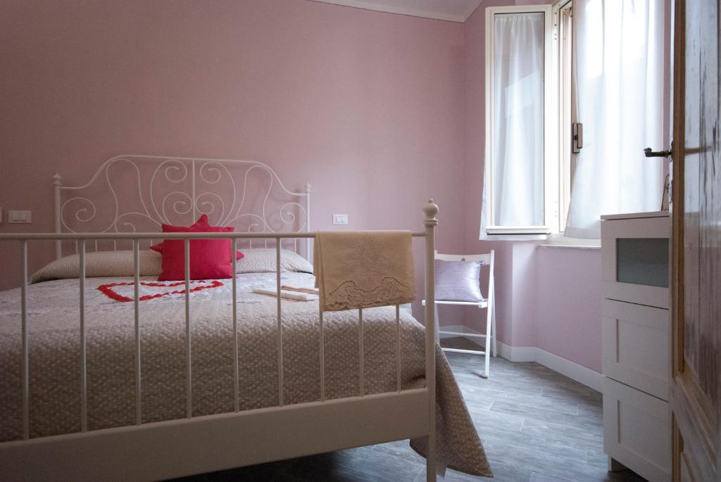 Postel nebo postele na pokoji v ubytování Cà de Lelio