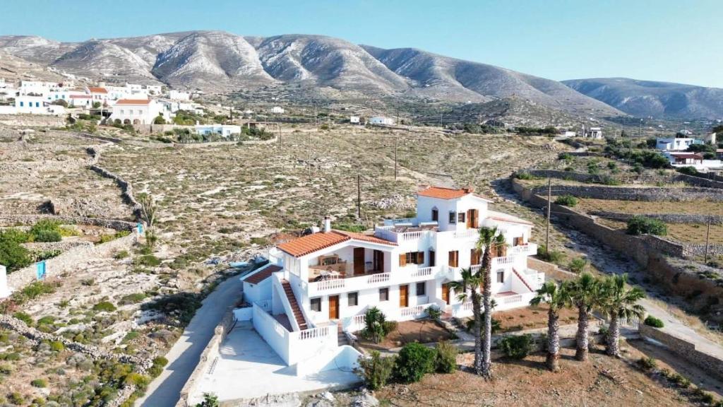 an aerial view of a house in the mountains at AVRA Apartments & Studios in Frý